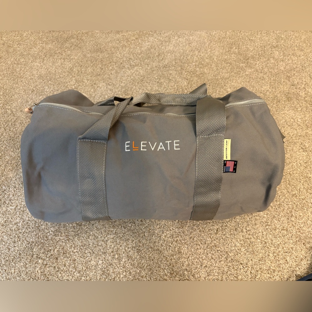 Gray Duffel Bag with Structured Design and Durable Fabric